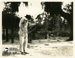 Allen Chesser, with Bow of Longleaf Pine and Wooden Metal-Tipped Arrow by Francis Harper