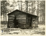 Old Log Schoolhouse, with Mattie Chesser, Who Used to Attend it by Francis Harper