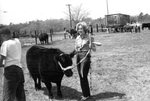 Young Woman with her Cow