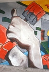Hand holding paint brush